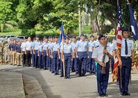 Air Force ROTC cadets stand in formation.
