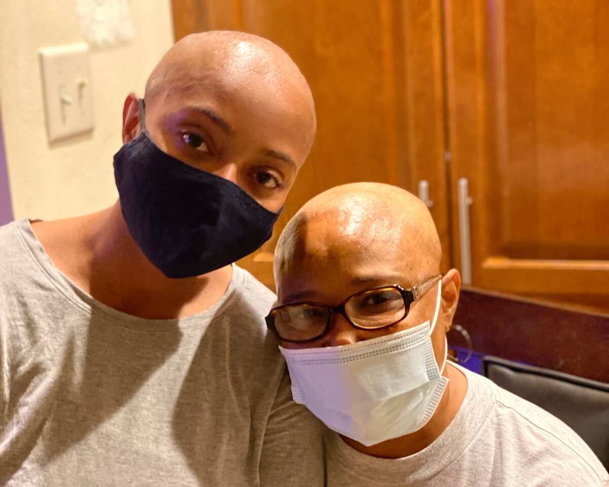 TSgt Carla Villarreal and her mother, Benedict Prospere, pose for a photo after they both shaved off their hair. Villareal’s mother Benedict began to lose her hair from chemotherapy treatments, so in an act of solidarity, Villarreal decided to shave off her hair to support her mother. (Courtesy photo by Carla Villarreal)