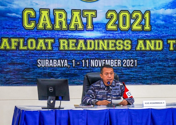 Indonesian Navy First Adm. Rachmad Jayadi, Second Fleet Command Chief Of Staff, addresses U.S. and Indonesian military personnel, in person and virtually, during the opening ceremony for Cooperation Afloat and Readiness at Sea Training (CARAT) Indonesia 2021. In its 27th year, the CARAT series is comprised of multinational exercises, designed to enhance U.S. and partner navies’ abilities to operate together in response to traditional and non-traditional maritime security challenges in the Indo-Pacific region.