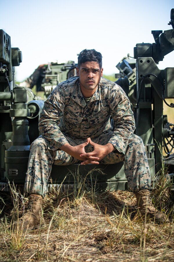U.S. Marine Corps Cpl. Carlos Hicano, a native of Worcester, Mass., and a field artillery cannoneer with 2d Battalion, 10th Marine Regiment, 2d Marine Division, poses for a photo during Exercise Rolling Thunder 1-22 on Fort Bragg, N.C., Oct. 19, 2021.