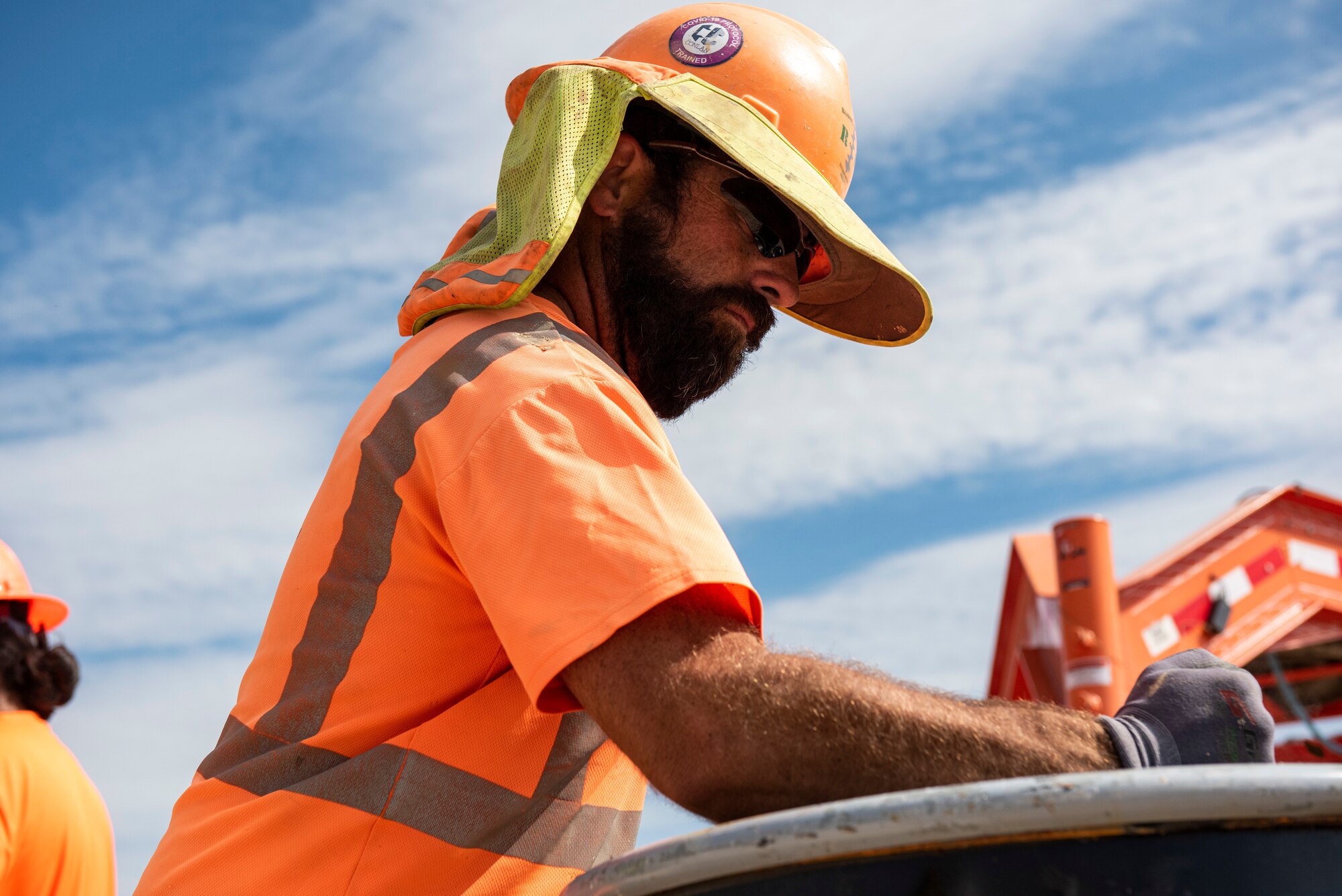A worker seals a barrel full of soil from a digging location before starting the process of pouring zero valent iron into the puncture created by the drill. The soil will be taken to an environmental lab and tested to know exactly what the levels of contamination are. (U.S. Air Force photo by Senior Airman David Phaff)