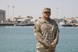 Sgt. 1st Class James R. Redner, an Army watercraft engineer assigned to the 401st Army Field Support Brigade, 1st Theater Sustainment Command, stands near the docks at Kuwait Naval Base, Kuwait, on Oct. 12, 21. The 17-year veteran has served all over the world, but never wants to forget about his cultural heritage with the Nuumu (Paiute) and Newe (Shoshone) people in Bishop, Calif.