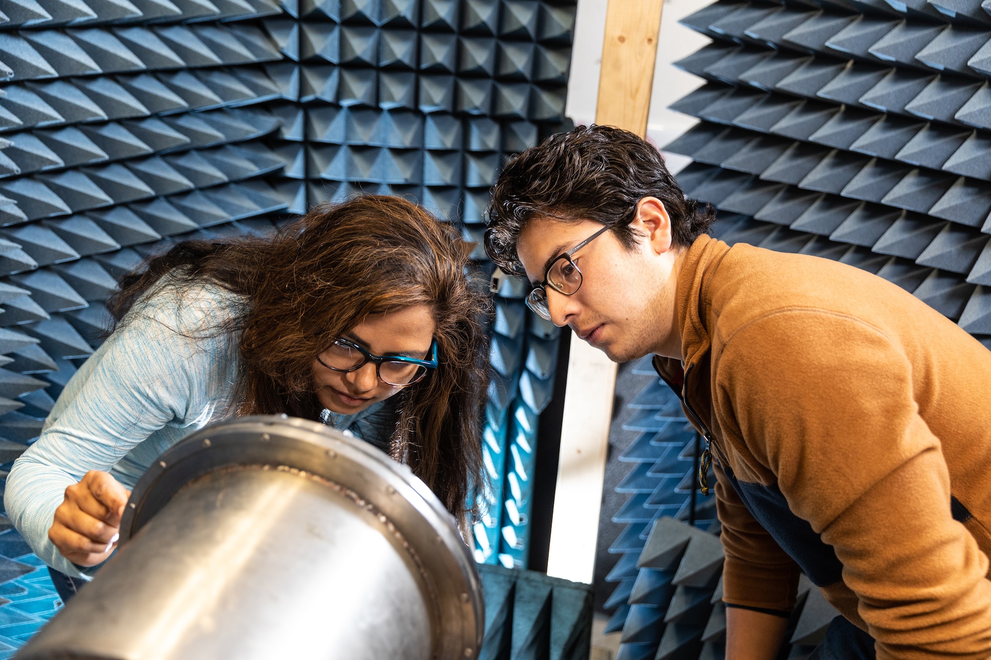 Ph.D. student Khandakar Nusrat Islam (left), and Master of Science degree graduate, Braulio Martinez (right) at work in the UNM Pulsed Power, Beams and Microwaves Laboratory. (UNM Courtesy Photo)