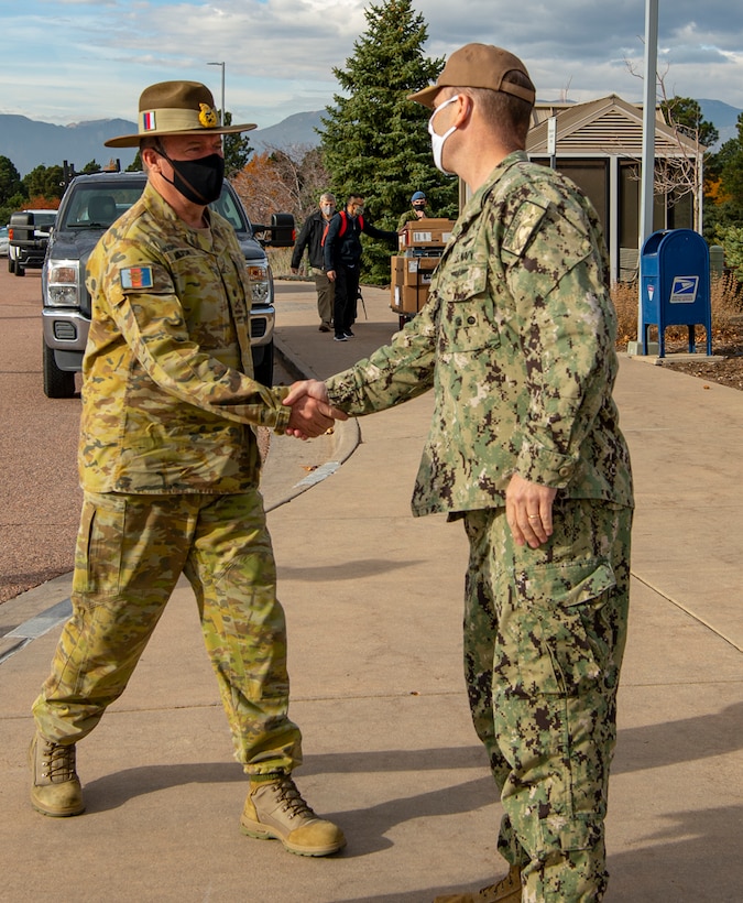 U.S. Navy and Australian Army officers meet at USSPACECOM headquarters.