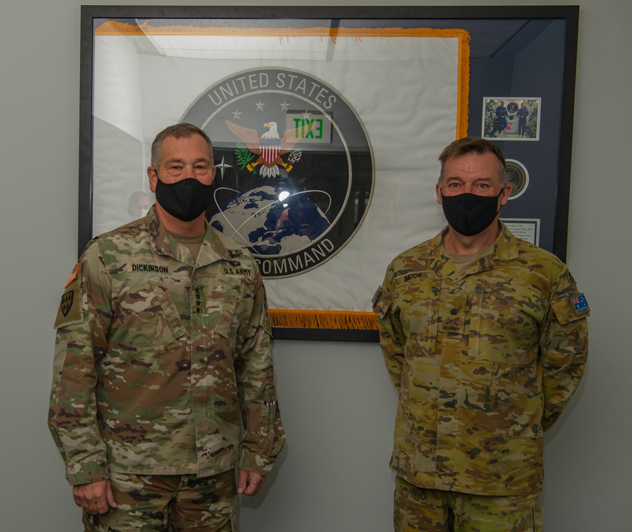 U.S. Army and Australian Army generals pose for a photo.