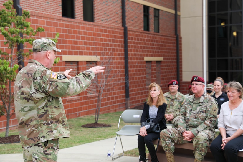 Maj. Gen. John F. Hussey, commanding general, 200th Military Police Command, provides anecdotes and honors to Maj. Gen. Jeffrey C. Coggin, commanding general, U.S. Army Civil Affairs and Psychological Operations Command (Airborne), during Coggin’s promotion ceremony, Oct. 25, 2021, Fort Bragg, N.C. Hussey took special care to recognize Coggin’s family for their sacrifices and support throughout his lengthy career.