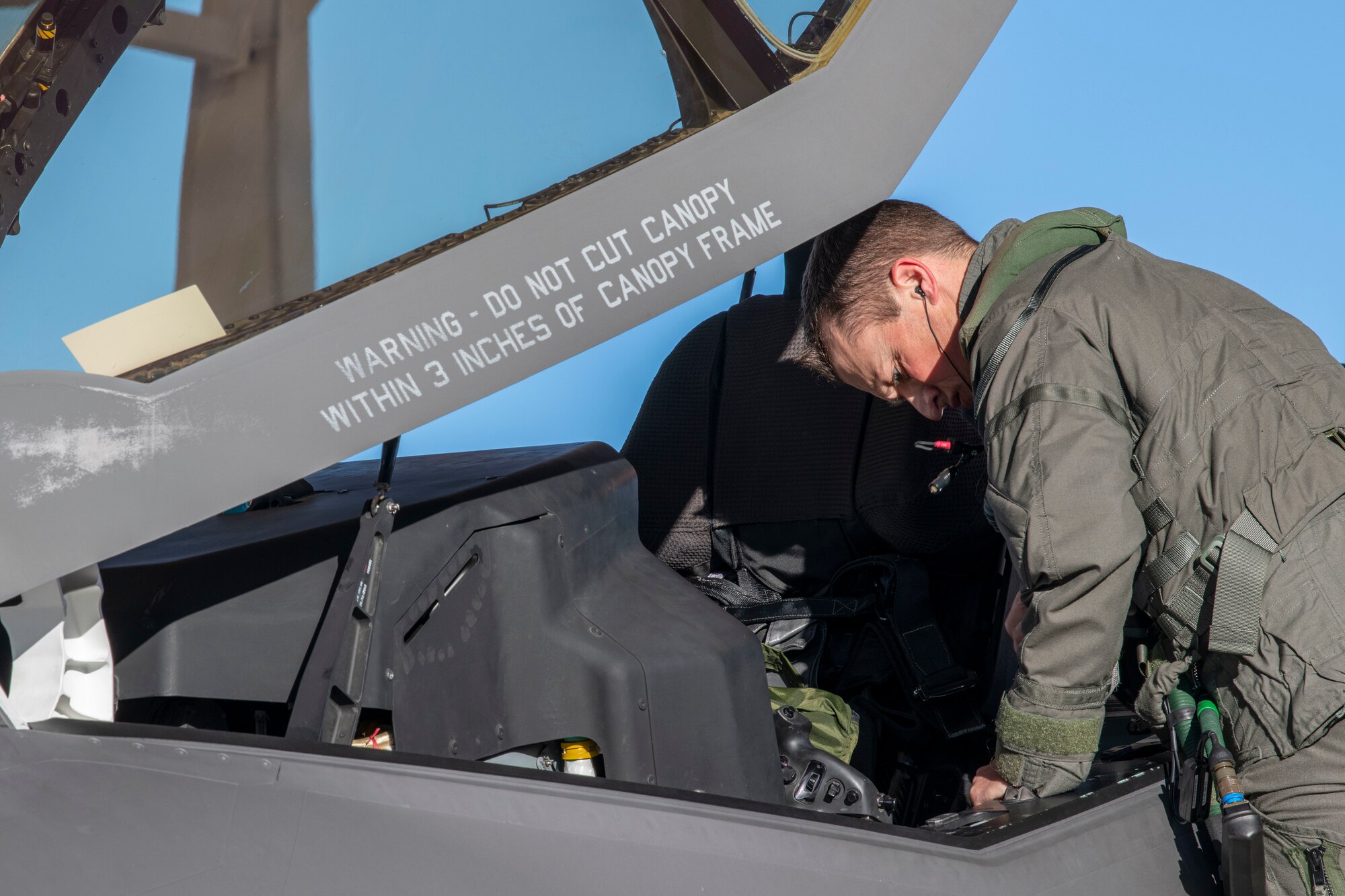 Maj. Derek Kirkwood, an F-35 Test Pilot assigned to the 461st Flight Test Squadron, completes pre-flight checks during Orange Flag 21-3 at Edwards Air Force Base, Calif., Oct. 26, 2021.