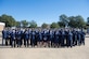 Airmen and officers gather for a group photo during the 2021 Community College of the Air Force graduation, Oct. 21, 2021, at Joint Base Andrews, Md. Various Airmen and families gathered at the base theater to congratulate the 2021 CCAF graduates on completing their degrees. (U.S. Air Force photo by Senior Airman Amir R. Young)