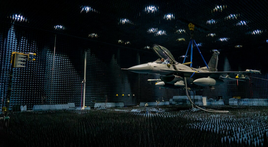 photo of F-16 going through tests at the Joint Preflight Integration of Munitions and Electronic Systems test facility at Eglin Air Force Base, Florida.