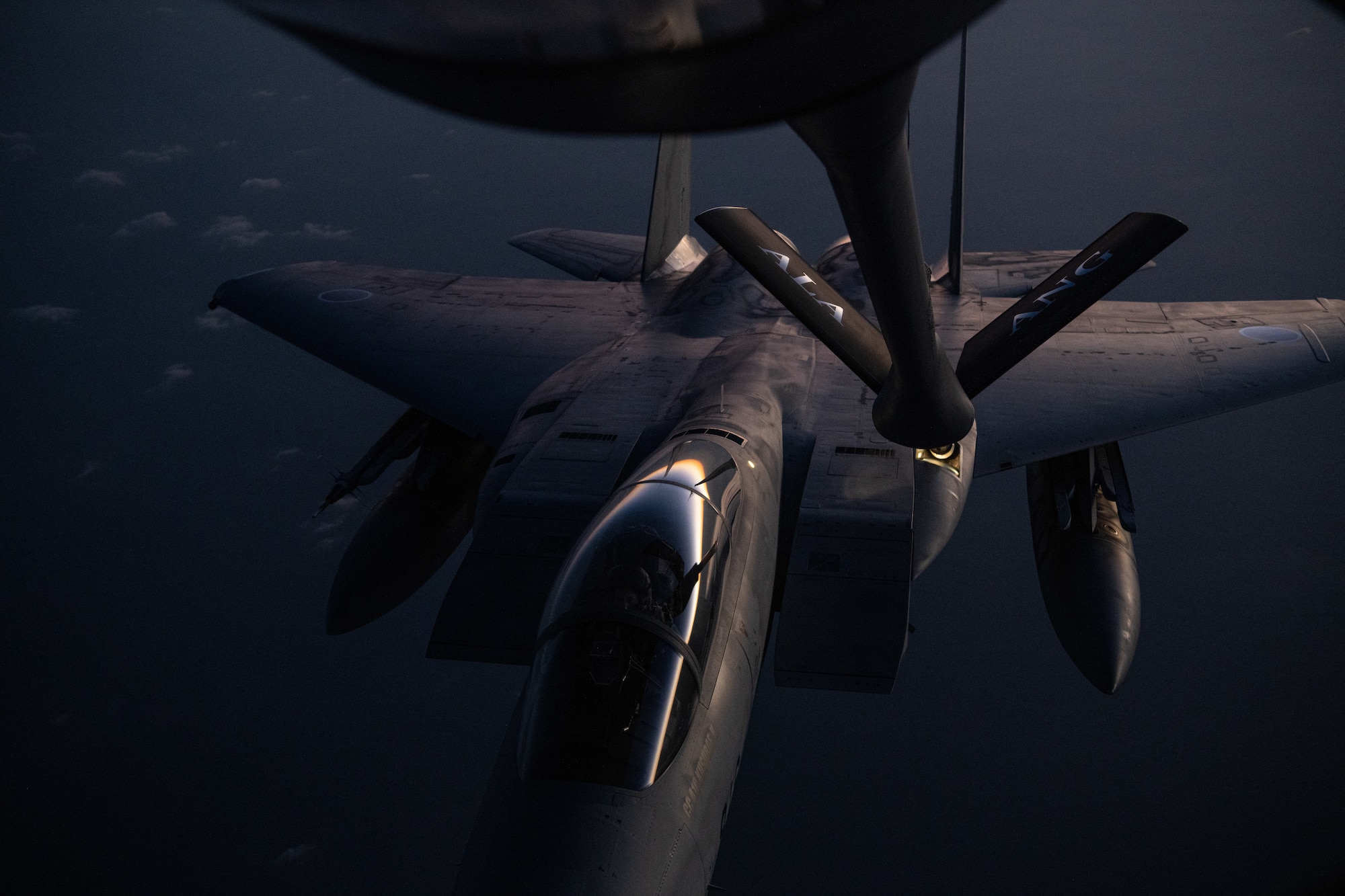 A U.S. Air Force KC-135 Stratotanker from the 909th Air Refueling Squadron refuels a Japan Air Self-Defense Force F-15J Eagle over the Pacific Ocean during Exercise Southern Beach, Oct. 28, 2021. Bilateral training exercises like Southern Beach help build trusting relationships among foreign and domestic forces, ensuring allies are able to come together to effectively respond to demanding scenarios and execute high-end missions in defense of a free and open Indo-Pacific region. (U.S. Air Force photo by Staff Sgt. Savannah L. Waters)