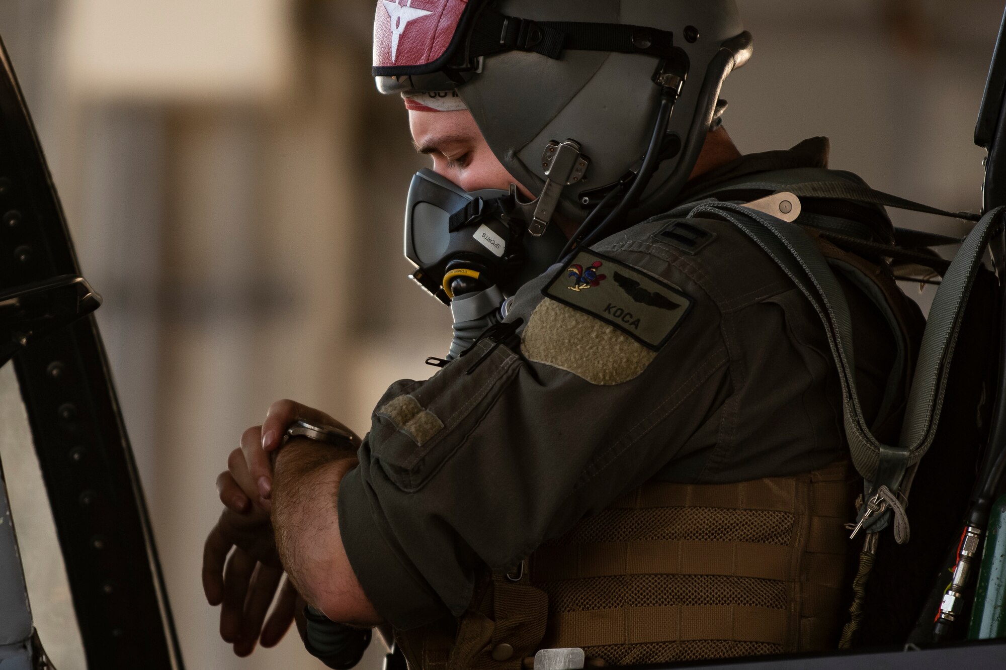 U.S. Air Force Capt. Ross Kohler, 67th Fighter Squadron F-15C Eagle pilot, monitors the time prior to engine start during Exercise Southern Beach at Kadena Air Base, Japan, Oct. 28, 2021. This was the first time since the inception of Southern Beach where the majority of the mission sets and a Japan-U.S. training program were conducted during night hours. (U.S. Air Force photo by Senior Airman Jessi Monte)