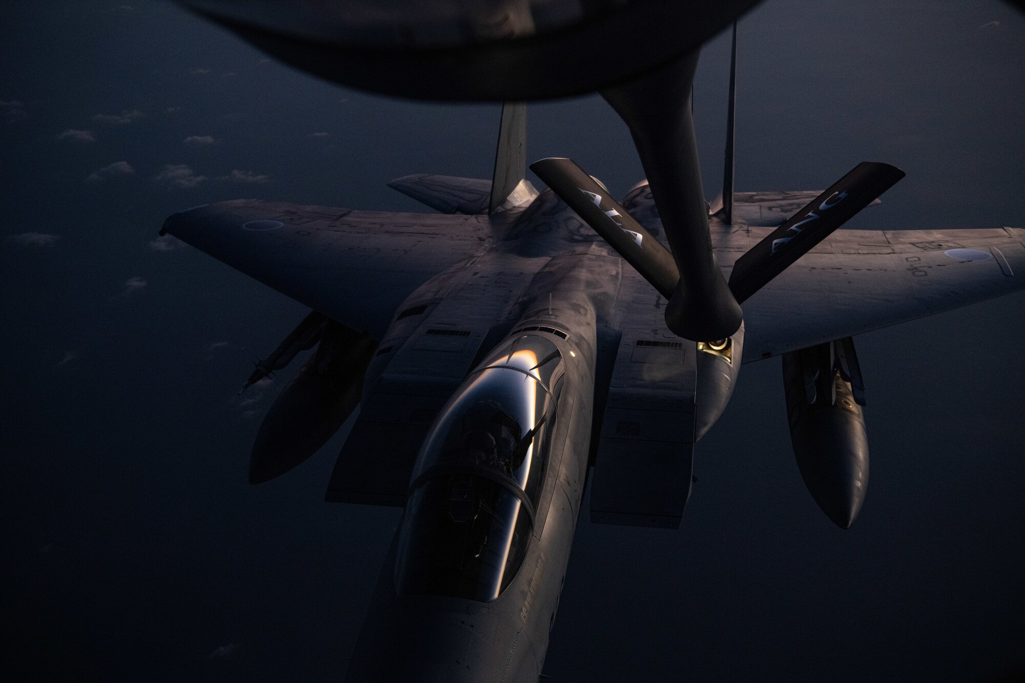 A U.S. Air Force KC-135 Stratotanker from the 909th Air Refueling Squadron refuels a Japan Air Self-Defense Force F-15J Eagle over the Pacific Ocean during Exercise Southern Beach, Oct. 28, 2021. Bilateral training exercises like Southern Beach help build trusting relationships among foreign and domestic forces, ensuring allies are able to come together to effectively respond to demanding scenarios and execute high-end missions in defense of a free and open Indo-Pacific region. (U.S. Air Force photo by Staff Sgt. Savannah L. Waters)
