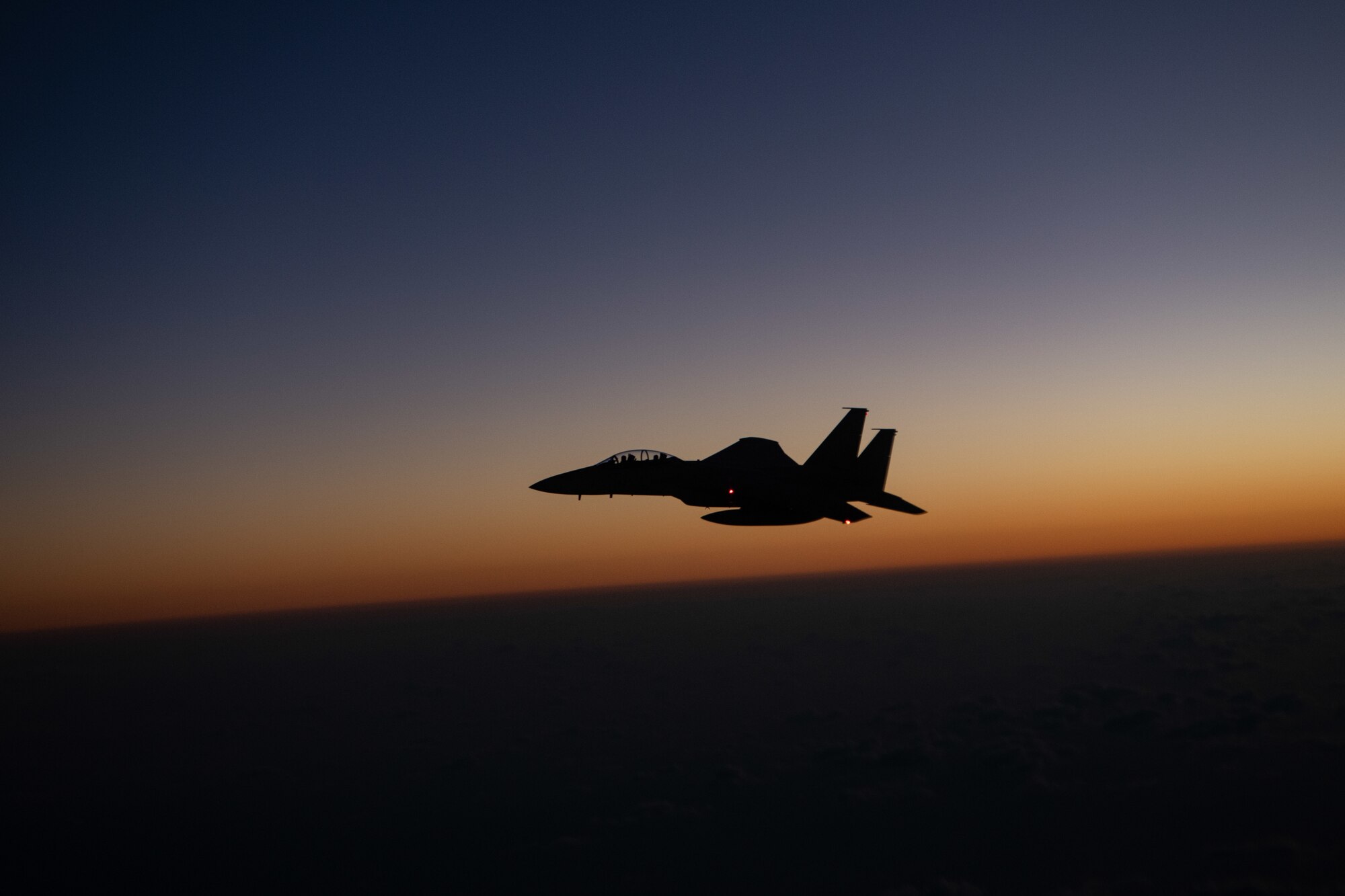 A Japan Air Self-Defense Force F-15DJ Eagle flies over the Pacific Ocean after refueling during Exercise Southern Beach, Oct. 28, 2021. Bilateral training exercises like Southern Beach help build trusting relationships among foreign and domestic forces, ensuring allies are able to come together to effectively respond to demanding scenarios and execute high-end missions in defense of a free and open Indo-Pacific region. (U.S. Air Force photo by Staff Sgt. Savannah L. Waters)