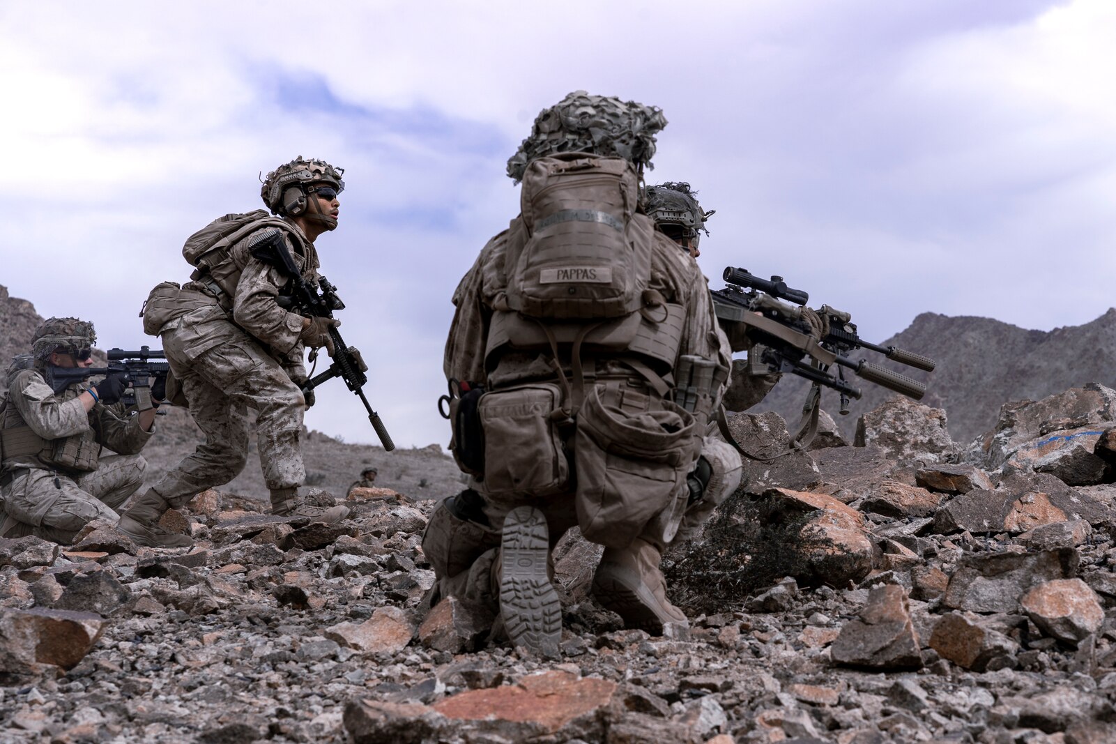 U.S. Marines with 1st Battalion, 3d Marines, participate in company attacks on Range 400 during Service Level Training Exercise 1-22 at Marine Corps Air Ground Combat Center Twentynine Palms, California, Oct. 4, 2021. Range 400 provides Marine Corps ground units the opportunity to test and enhance their ability to command and control forces in a contested environment. (U.S. Marine Corps photo by Cpl. Juan Carpanzano)