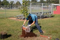 Norfolk Naval Shipyard’s (NNSY) Natural Resources Program office and NNSY volunteers participated in the National Environmental Education Foundation’s (NEEF) National Public Lands Day (NPLD) by planting native trees at the Craddock Little League Fields. These efforts were to enhance broader Environmental Stewardship, improve air quality, reduce and store excess carbon, stabilize soils, provide shade, and increase native biodiversity. Established in 1994 and held annually, NPLD is the nation's largest single-day volunteer event for public lands.