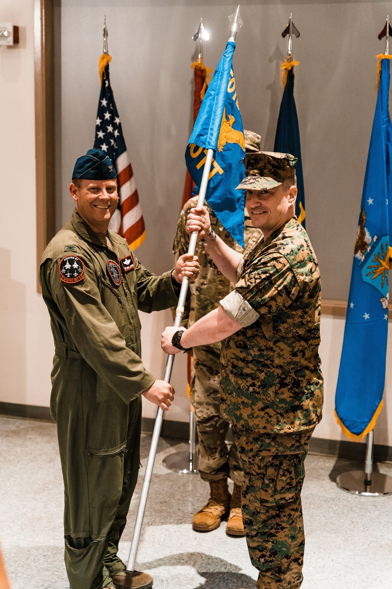 LtCol Dave Merritt (right) assumes command of the U.S. Operational Test Team from Air Force Operational Test and Evaluation Center Detachment 6 Commander Col. Dan Javorsek (left).