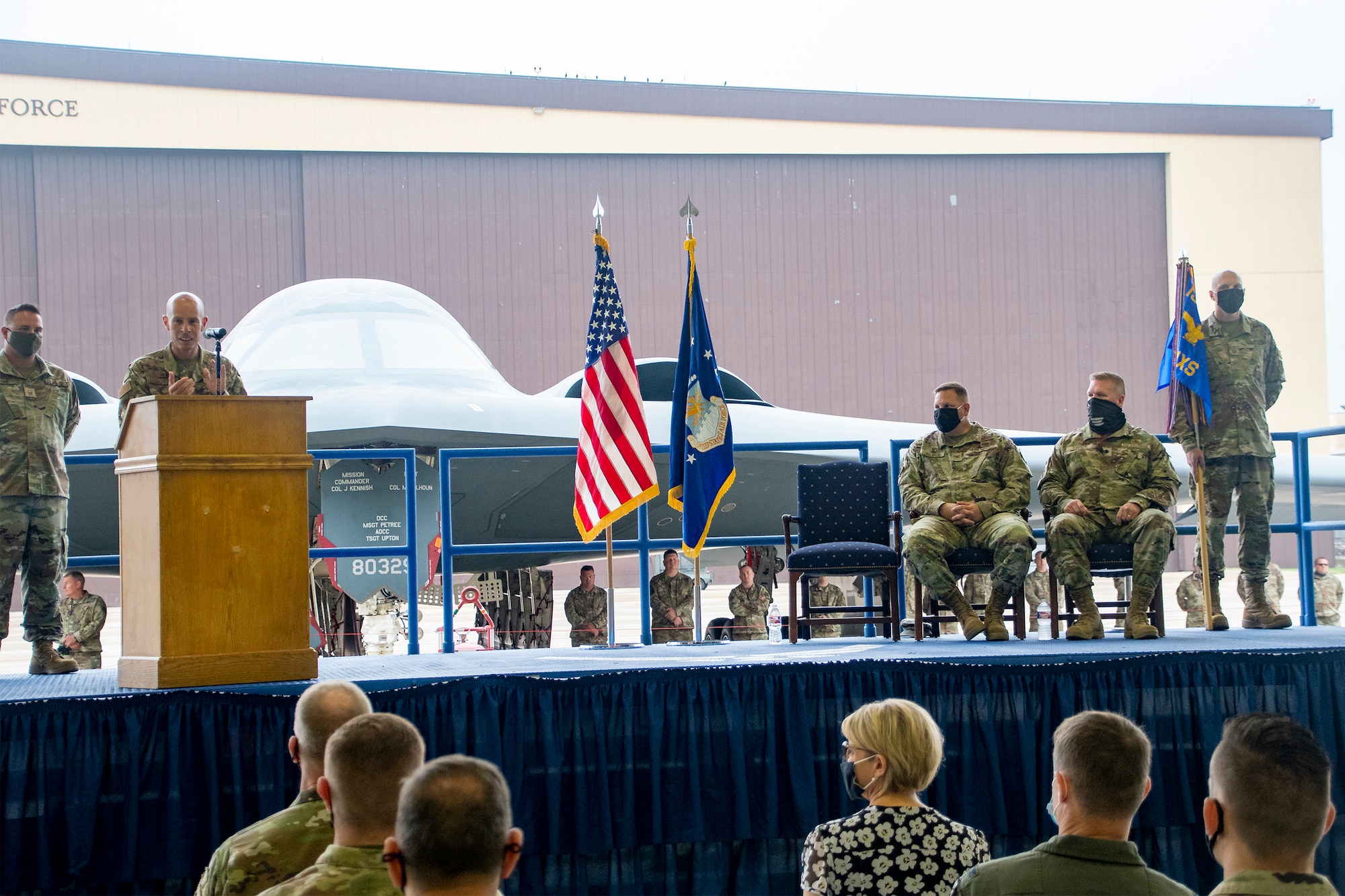 131st Bomb Wing Commander Col. Matthew Calhoun delivers remarks during a change of command ceremony for the 131st Maintenance Group Oct. 2, 2021 at Whiteman Air Force Base, Missouri. Outgoing Group Commander Col. Michael Belardo was relieved by Lt. Col. Chad Larson. (U.S. Air National Guard photo by Staff Sgt. Joshua Colligan)