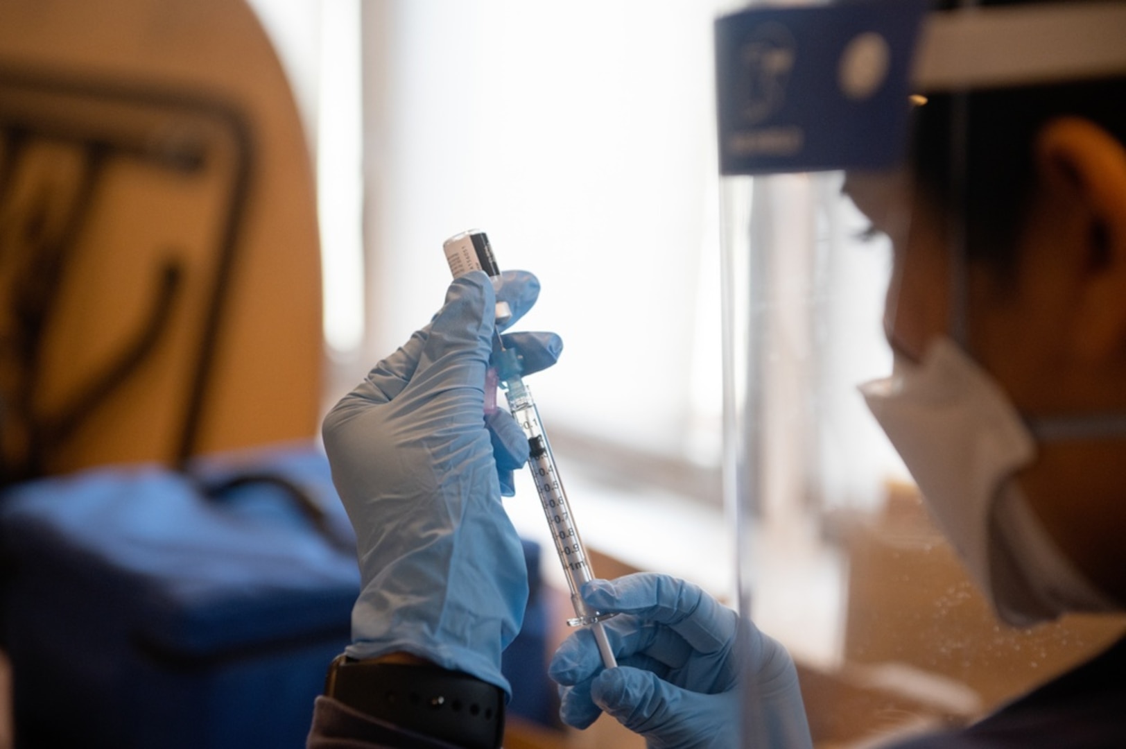 A Coast Guard health services technician draws a single dose of the COVID-19 vaccine from a vial at U.S. Coast Guard Training Center Cape May, N.J., Jan. 8, 2021. Our goal is to limit, to the greatest extent possible, any outside factor that would jeopardize the health and safety of our people and ultimately affect our missions. (U.S. Coast Guard photo by Petty Officer 2nd Class Shannon Kearney)