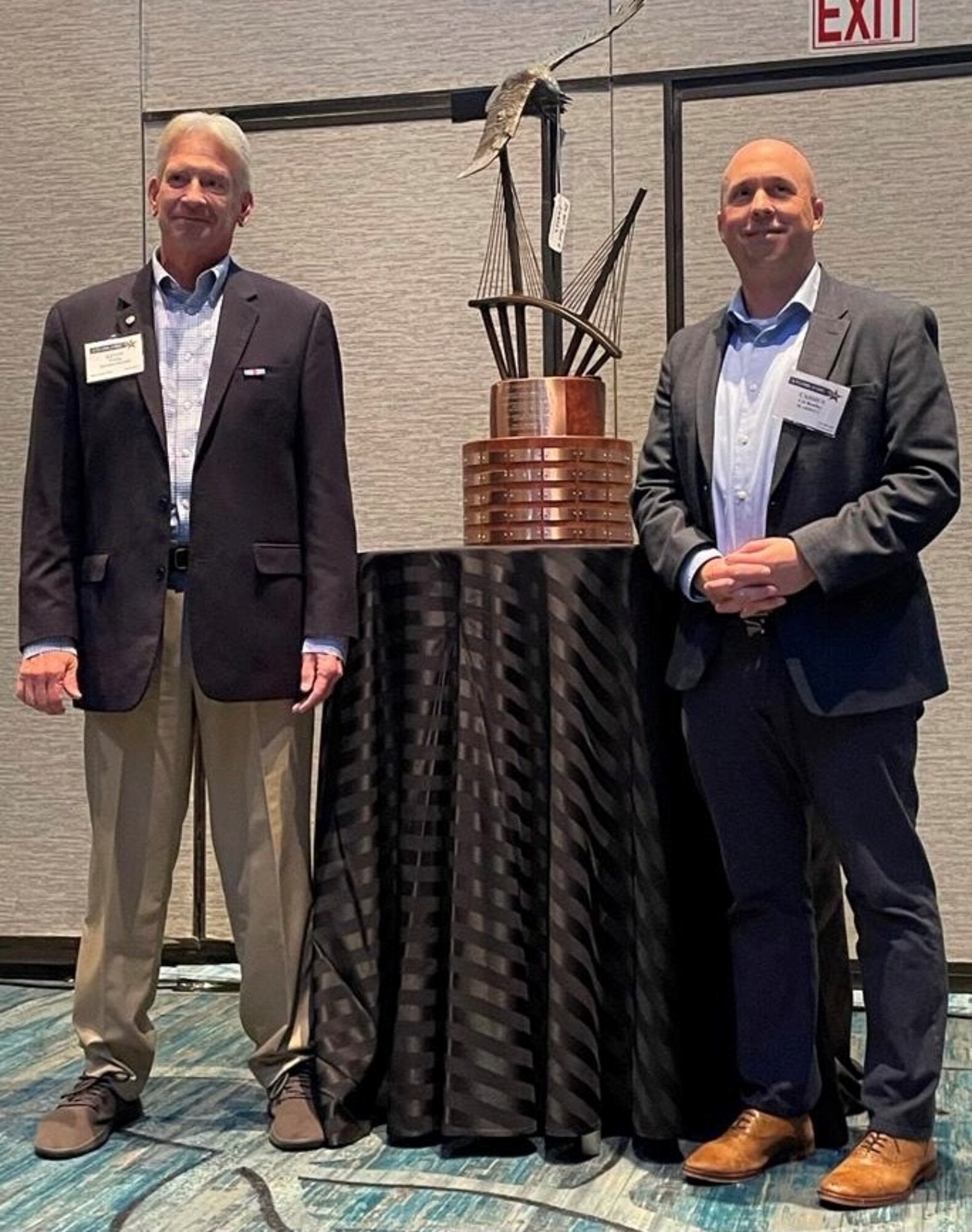 Kevin Twohig, Air Mobility Command civic leader is presented the Tampa Bay Defense Alliance trophy.