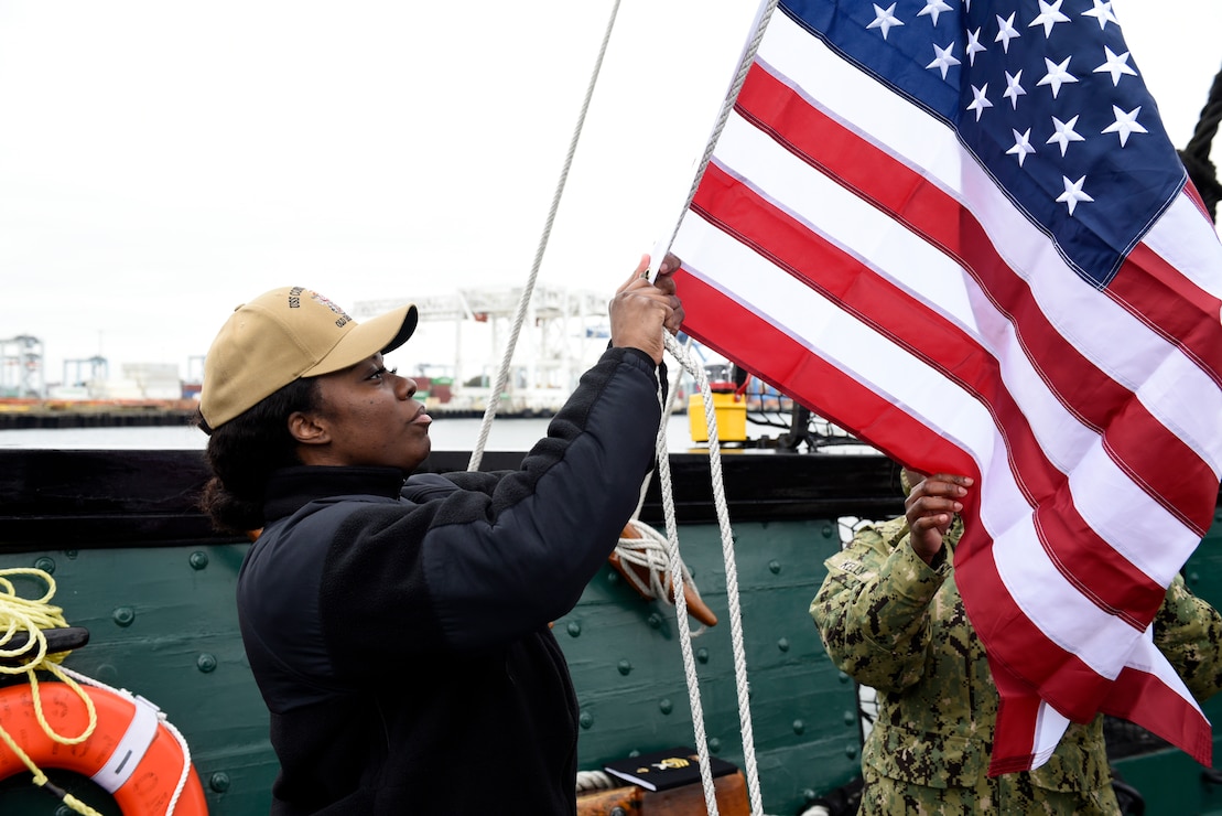 Chief petty officer (CPO) selectees conduct line handling operations during CPO Heritage Week on board the USS Constitution.