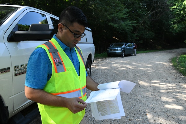 Aras Barzanji is the U.S. Army Corps of Engineers Nashville District Employee of the Month for August 2021. He is seen here reviewing Waverly, Tenn. Flood data.