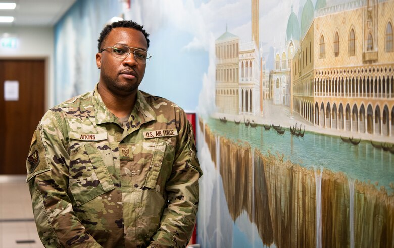 Tech. Sgt. Christopher Atkins, 31st Medical Group pediatrics NCOIC pauses for a picture after returning from Operation Allies Welcome, October 23, 2021, at Aviano Air Base, Italy. Member of the 31st MDG deployed to Ramstein Air Base to provide medical support for all evacuees as they prepared to move to the United States. (U.S. Air Force photo by Senior Airman Elijah M. Dority)