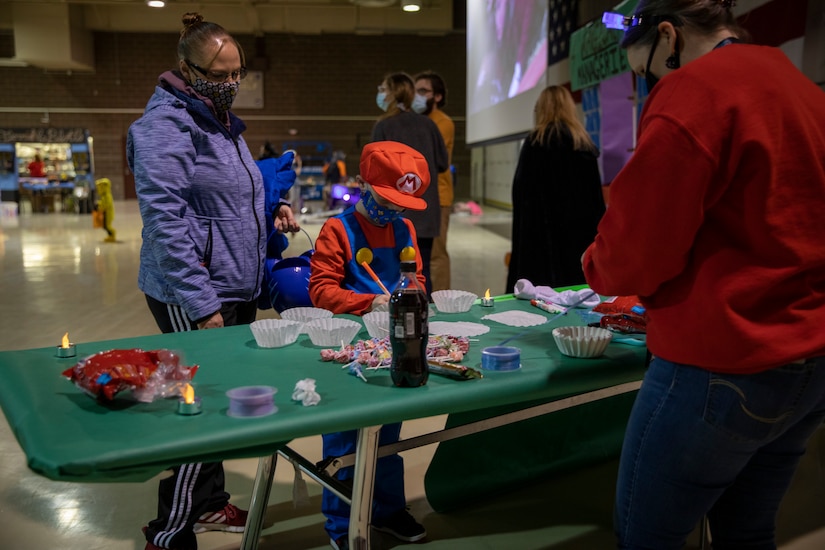 The Alaska National Guard's Child & Youth Program hosted an annual Halloween event for the military youth and families within the Alaska National Guard at the Alaska National Guard armory on Joint Base Elmendorf-Richardson, Oct. 30. The event consisted of treats, crafts, games and a movie screening. (U.S. Army National Guard photo by Spc. Grace Nechanicky)