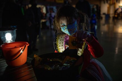 The Alaska National Guard's Child & Youth Program hosted an annual Halloween event for the military youth and families within the Alaska National Guard at the Alaska National Guard armory on Joint Base Elmendorf-Richardson, Oct. 30. The event consisted of treats, crafts, games and a movie screening. (U.S. Army National Guard photo by Spc. Grace Nechanicky)