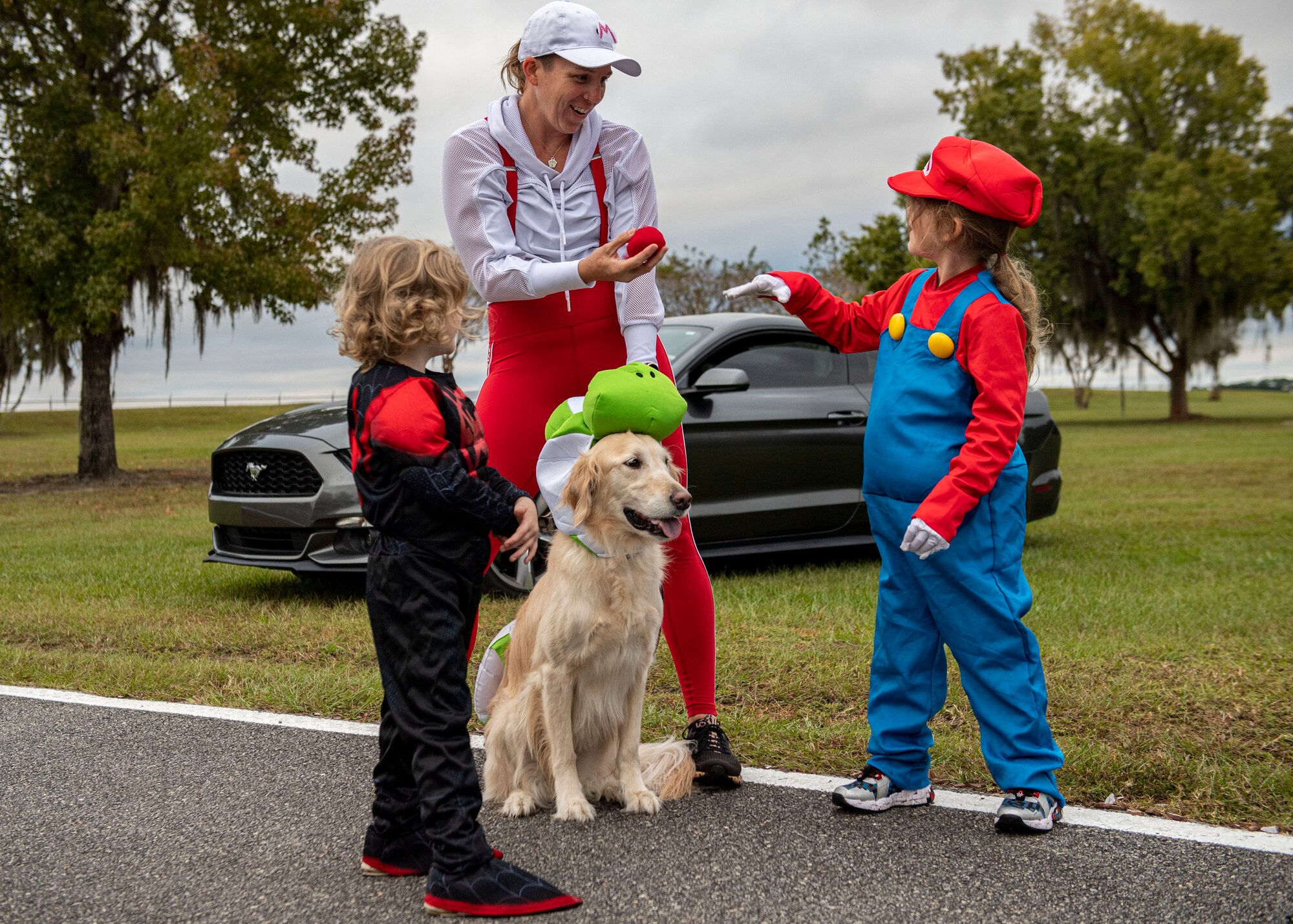 A family waits for a race to start