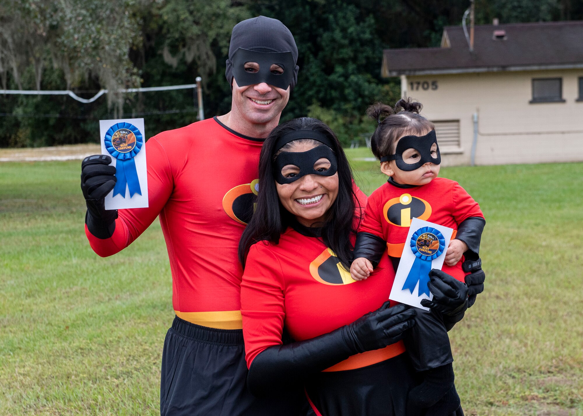 A family pose for a costume photo