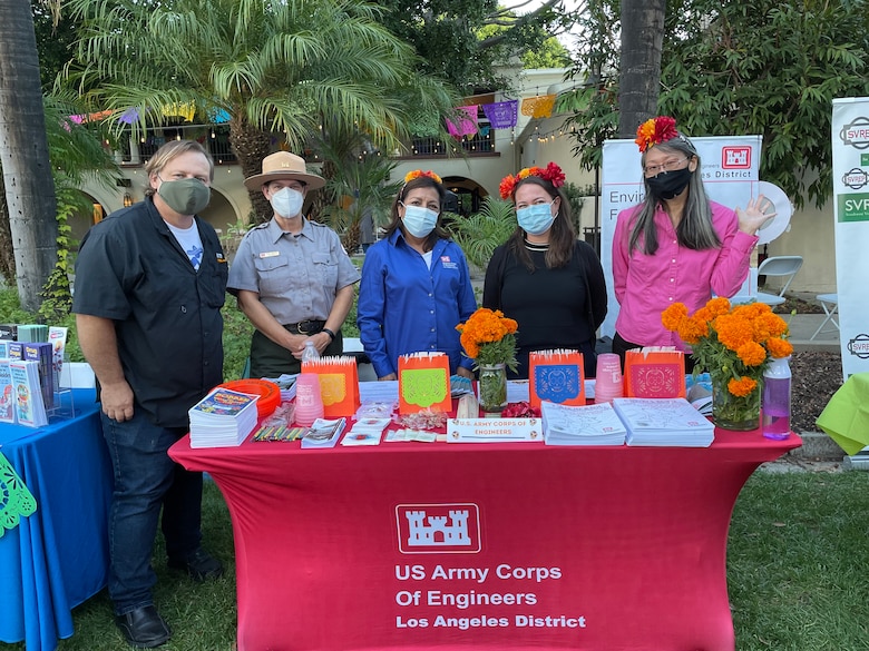 Professionals of the LA District comprising diverse specialties host an information and outreach booth at the Día de los Muertos community event and procession Oct. 26 at the LA River Center and Gardens in LA’s Cypress Park neighborhood. Hundreds of community members attended the event, which was organized by Mujeres de la Tierra, a nonprofit group whose mission is to “inspire, motivate and engage women and their children to take ownership and leadership of their neighborhood and local community issues.”