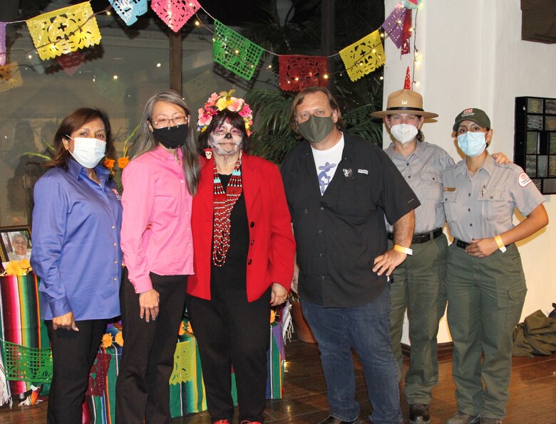 Professionals of the LA District gather for a photo with Irma R. Muñoz, third from left, the founder and executive director of Mujeres de la Tierra, an environmental equity nonprofit based in Los Angeles, at the Día de los Muertos community event and procession Oct. 26 at the LA River Center and Gardens in LA’s Cypress Park neighborhood.