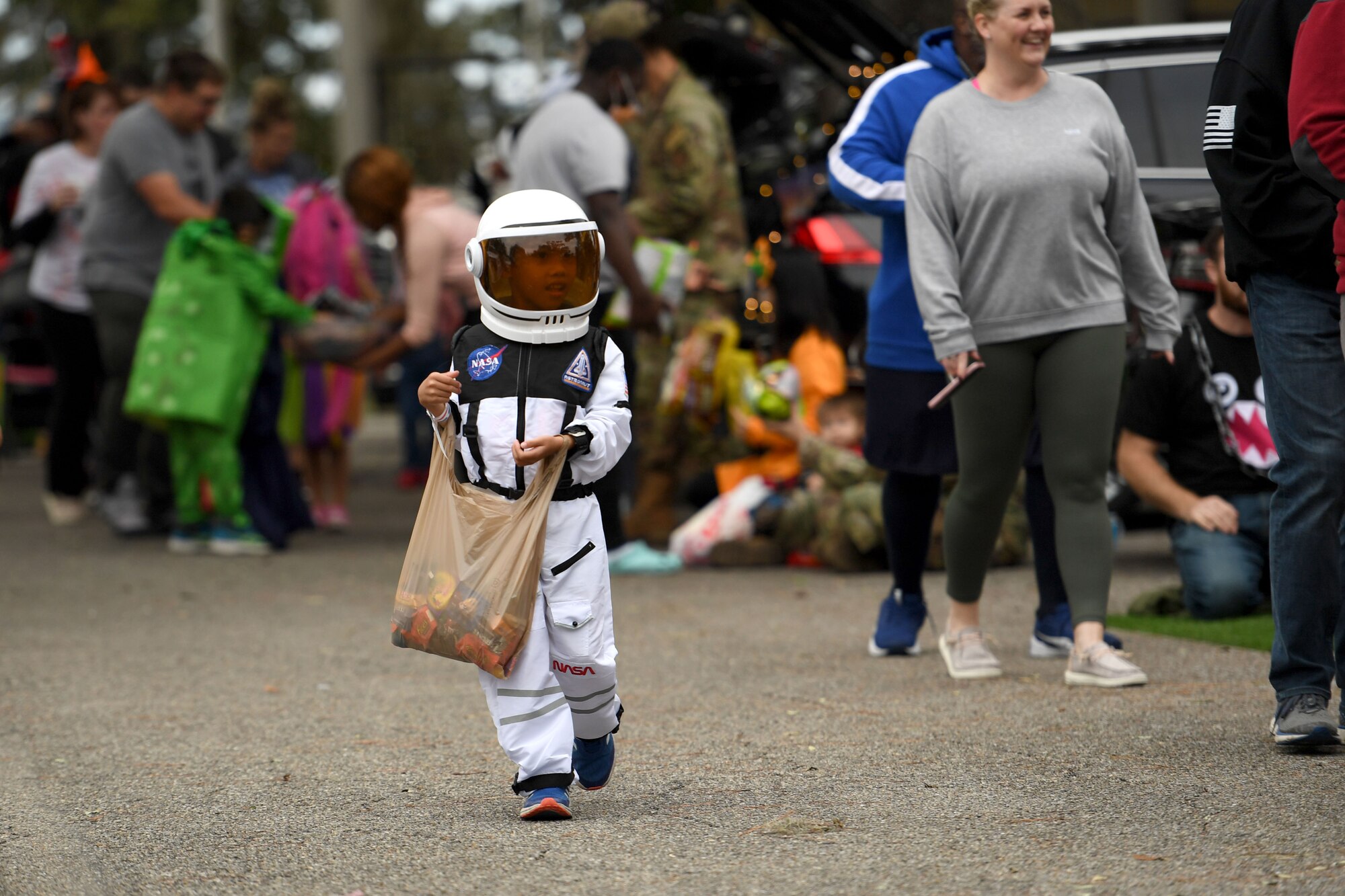 Keesler families attend Ghouls in the Park at the marina park on Keesler Air Force Base, Mississippi, Oct. 29, 2021. The Halloween event also featured a haunted house, a boo bus and various games for children of all ages. (U.S. Air Force photo by Kemberly Groue)