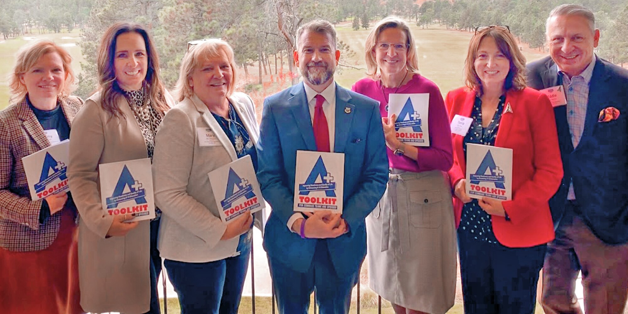 Brian Selmeski (center), chair of the Air University Public K-12 Education Working Group and co-author of the Toolkit, and Mollie Raymond (right of Selmeski), spouse of Space Force Chief of Space Operations Gen. John Raymond, pose for a photo with Space Force senior spouses at the Corona Conference Oct. 21, 2021, at the U.S. Air Force Academy.