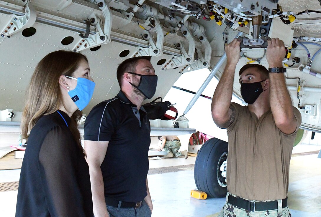 211026-N-DG679-026
JACKSONVILLE, Fla. (Oct. 26, 2021) Fleet Readiness Center Southeast (FRCSE) P-8 Fleet Support Team (FST) structural engineers Victoria Gore (left) and Casey Jones (center) observe as Aviation Ordnanceman 2nd Class Jaice Snyder performs a visual and functional check of the swaybrace assembly on a P-8A Poseidon. FRCSE’s FST members handle all organizational-level and depot-level issues with the airframe, develop and plan repairs, and oversee modifications of assigned aircraft. (U.S. Navy Photo by Toiete Jackson/Released)