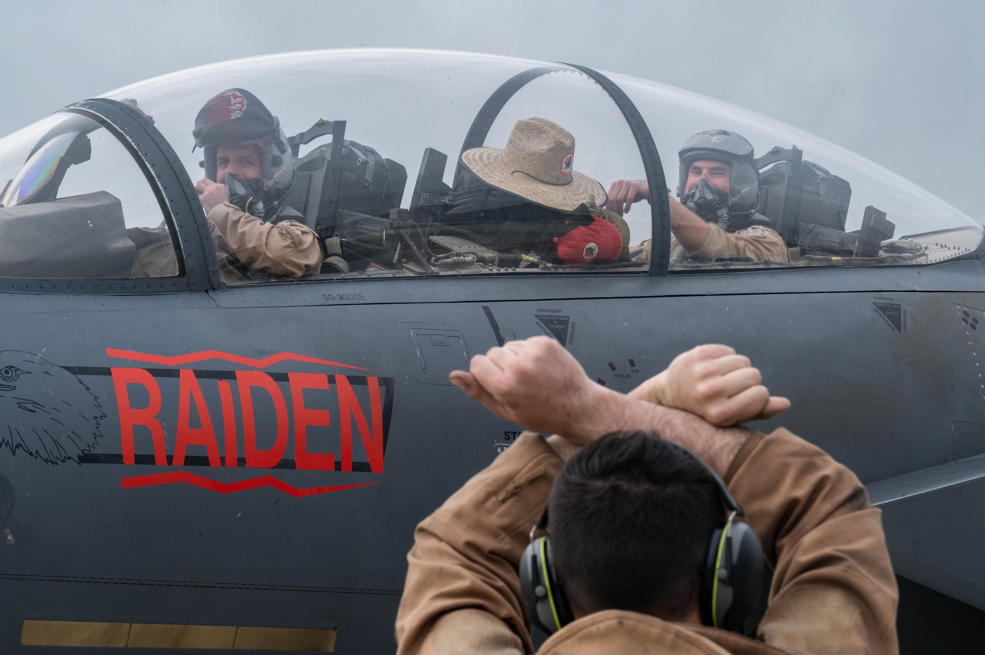 U.S. Air Force aircrew assigned to the 494th Fighter Squadron prepare to exit an F-15E Strike Eagle at Royal Air Force Lakenheath, England, Oct. 26, 2021. Deployed as the 494th Expeditionary Fighter Squadron at the332nd Expeditionary Wing, the Panthers generated over 1,900 sorties and over 8,400 hours of combat operations while in theater. (U.S. Air Force photo by Airman 1st Class Jacob Wood)