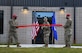 Col. Tyler Schaff, 316th Wing and installation commander, cuts a ribbon to signify the opening of the new Combat Arms Training and Maintenance facility at Joint Base Andrews, Md., Nov. 1, 2021. The new facility features many upgrades from the previous building, including a new 21-position firing range, weapons and range equipment maintenance area and office and common spaces for the instructors. (U.S. Air Force photo by Senior Airman Spencer Slocum)