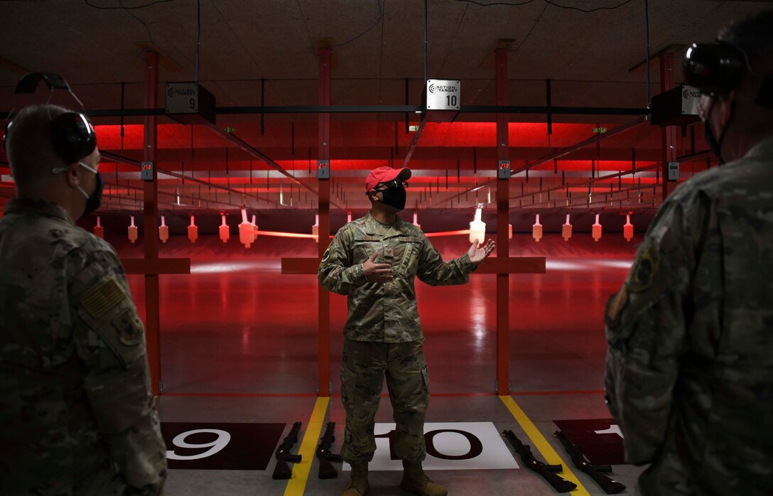 Tech. Sgt. Manuel Amaya, 316th Security Support Squadron combat arms NCO in-charge, briefs guests on the new Combat Arms Training and Maintenance facility shooting range at Joint Base Andrews, Md., Nov. 1, 2021. The brief was part of a tour following the ribbon-cutting ceremony for the opening of the new CATM facility. (U.S. Air Force photo by Senior Airman Spencer Slocum)