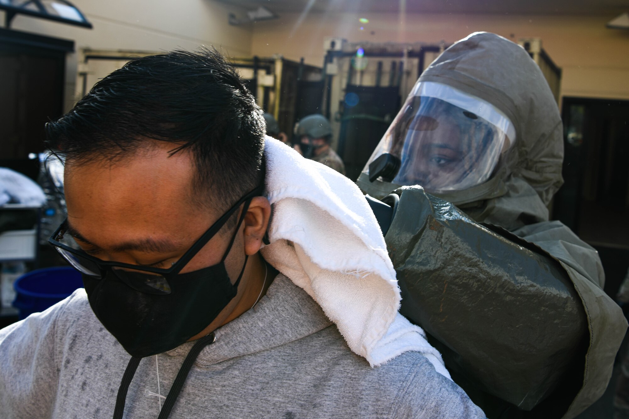 n Airman assigned to the 31st Medical Group wipes down a patient following decontamination procedures during a base defense exercise at Aviano Air Base, Italy, Nov. 2, 2021. The exercise was designed to test the 31st Fighter Wing’s ability to respond to a variety of potential threats, protect and generate combat airpower, and defend the base. (U.S. Air Force photo by Senior Airman Elijah M. Dority)