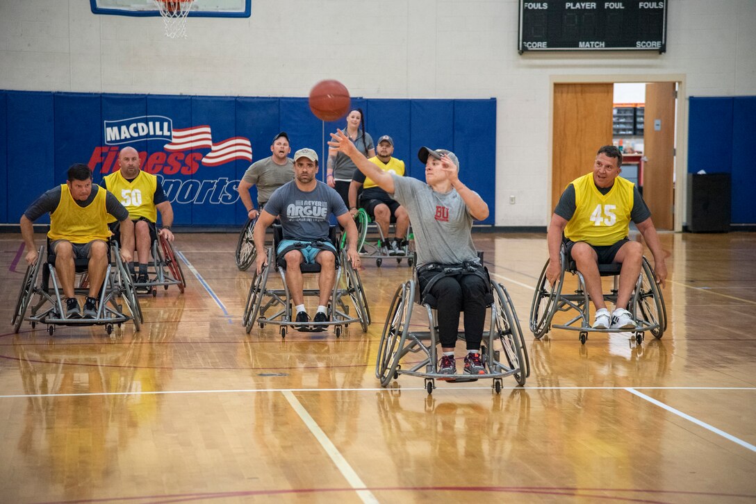 USSOCOM athletes practice wheelchair basketball.