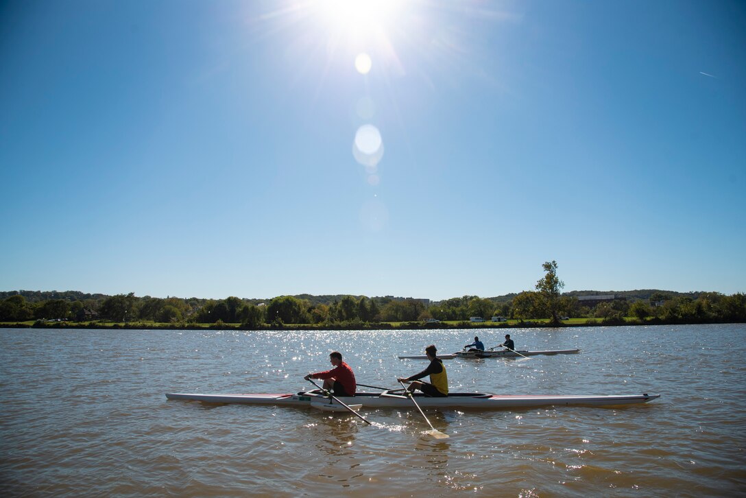 Recovering service members and staff row on the Anacostia River.