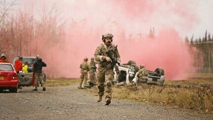 Alaska Air National Guardsmen assigned to the 212th Rescue Squadron, 176th Wing, respond to a simulated mass-casualty incident during a full mission profile exercise at Joint Base Elmendorf-Richardson, Alaska, Oct. 13, 2021. The busiest rescue force in the Department of Defense, the 212th RQS provides elite pararescuemen and combat rescue officers that are uniquely skilled in integrating air and ground capabilities to carry out the 176th Wing’s wartime and peacetime personnel recovery missions. (U.S. Army National Guard photo by Dana Rosso)