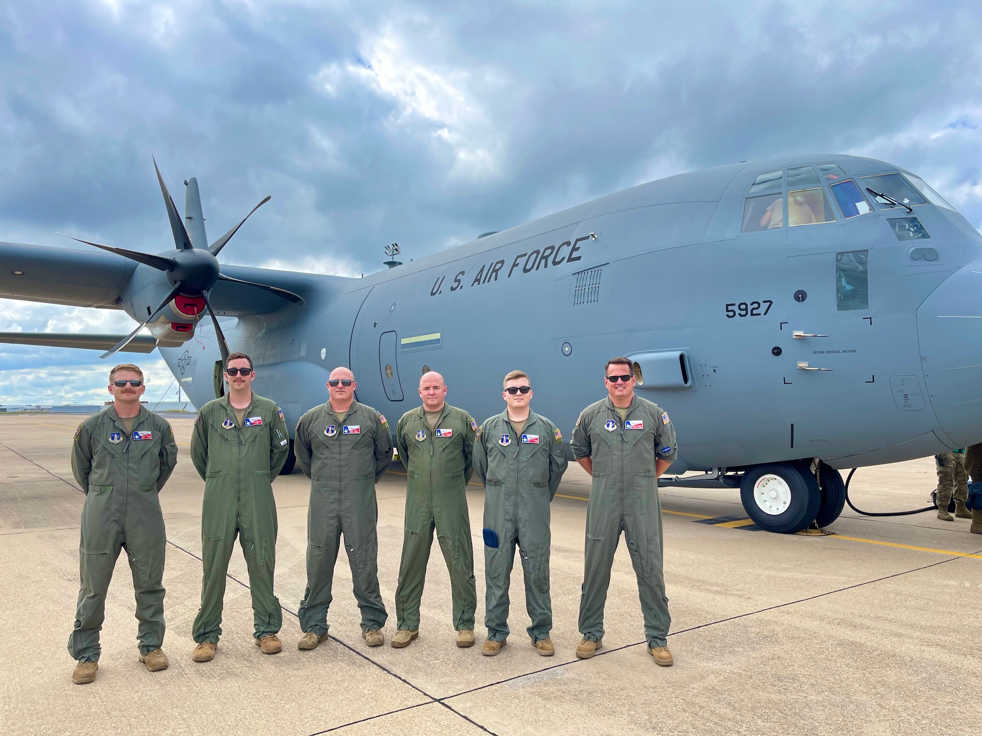 Air crew pose with newest C-130J Super Hercules