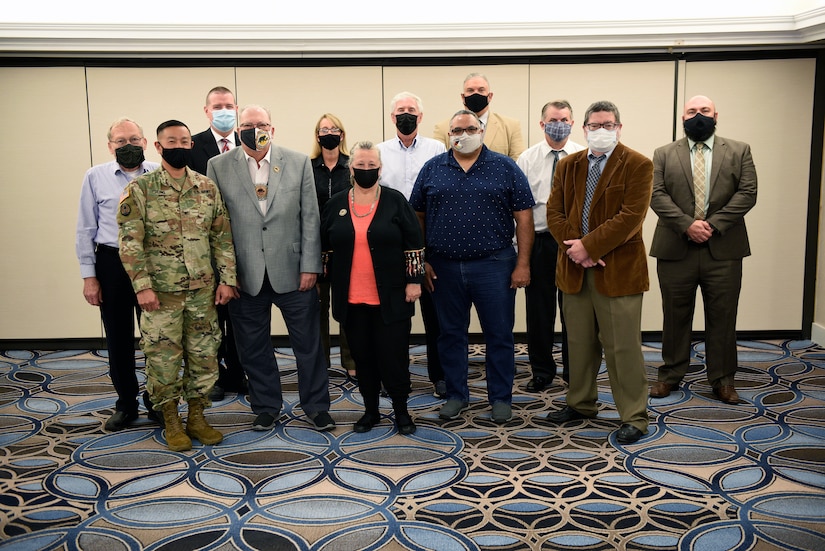 Joint Base Langley-Eustis leadership pose with members of the federally-recognized Nansemond Indian Nation and the Chickahominy Indian Tribe during the annual Tribal Consultation held at Joint Base Langley-Eustis.