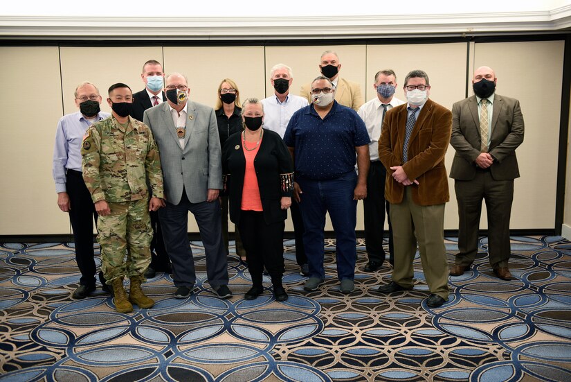 Joint Base Langley-Eustis leadership pose with members of the federally-recognized Nansemond Indian Nation and the Chickahominy Indian Tribe during the annual Tribal Consultation held at Joint Base Langley-Eustis.