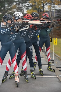 Vermont Army National Guard Soldiers who are members of U.S. Biathlon teams pose for a photo during a practice session at the Camp Ethan Allen Training Site in Jericho, Vermont, on Nov. 2, 2021. CEATS is the Biathlon training site for the National Guard.. (U.S. Army National Guard photo by Don Branum)