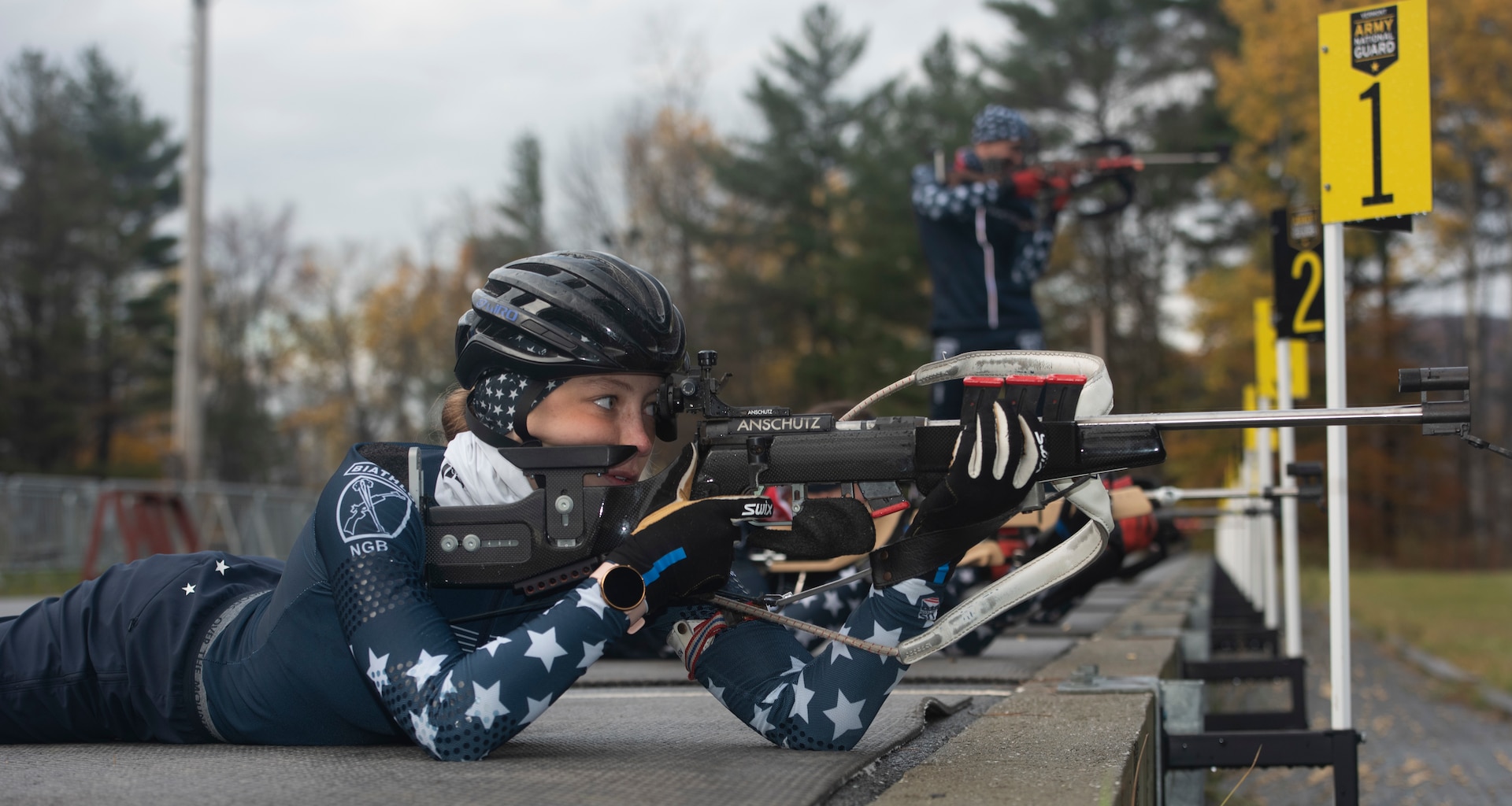 Pvt. Lina Farra, a human resources speciialist with the Law and Order Detachment, Garrison Support Command, Vermont Army National Guard, dry fires a Biathlon rifle during practice at the Camp Ethan Allen Training Site in Jericho, Vermont, on Nov. 2, 2021. Farra, a native of Heber City, Utah, competed in the 2019 and 2020 International Biathlon Union Youth/Junior world championships. (U.S. Army National Guard photo by Don Branum)