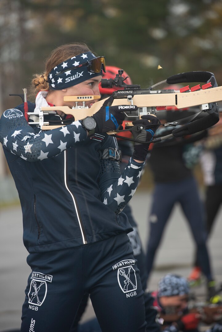 Spc. Deedra Irwin, a human resources specialist with 86th Troop Command, 86th Infantry Brigade Combat Team (Mountain), Vermont National Guard, fires a Biathlon rifle during a practice session at the Camp Ethan Allen Training Site in Jericho, Vermont, on Nov. 2, 2021. Irwin, a native of Pulaski, Wisconsin, competed in the 2021 Biathlon World Championship and is on Team USA's 2021-2022 National A Team. (U.S. Army National Guard photo by Don Branum)