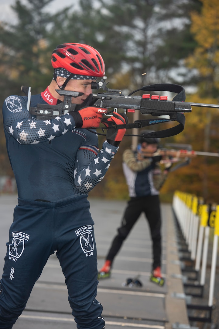 Spc. Vaclav Cervenka, a carpentry and masonry specialist with Det. 1, Headquarters Company, Garrison Support Command, Vermont Army National Guard, practices firing a Biathlon rifle during practice at the Camp Ethan Allen Training Site in Jericho, Vermont, on Nov. 2, 2021. Cervenka is on Team USA's 2021-2022 X Team. (U.S. Army National Guard photo by Don Branum)