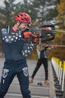 Spc. Vaclav Cervenka, a carpentry and masonry specialist with Det. 1, Headquarters Company, Garrison Support Command, Vermont Army National Guard, practices firing a Biathlon rifle during practice at the Camp Ethan Allen Training Site in Jericho, Vermont, on Nov. 2, 2021. Cervenka is on Team USA's 2021-2022 X Team. (U.S. Army National Guard photo by Don Branum)